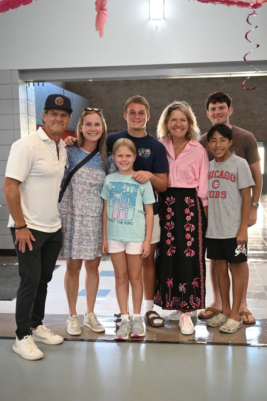 A family poses together at the Community for a Cause benefit